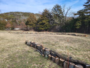 Logs Positioned along Swales for Moisture Retention